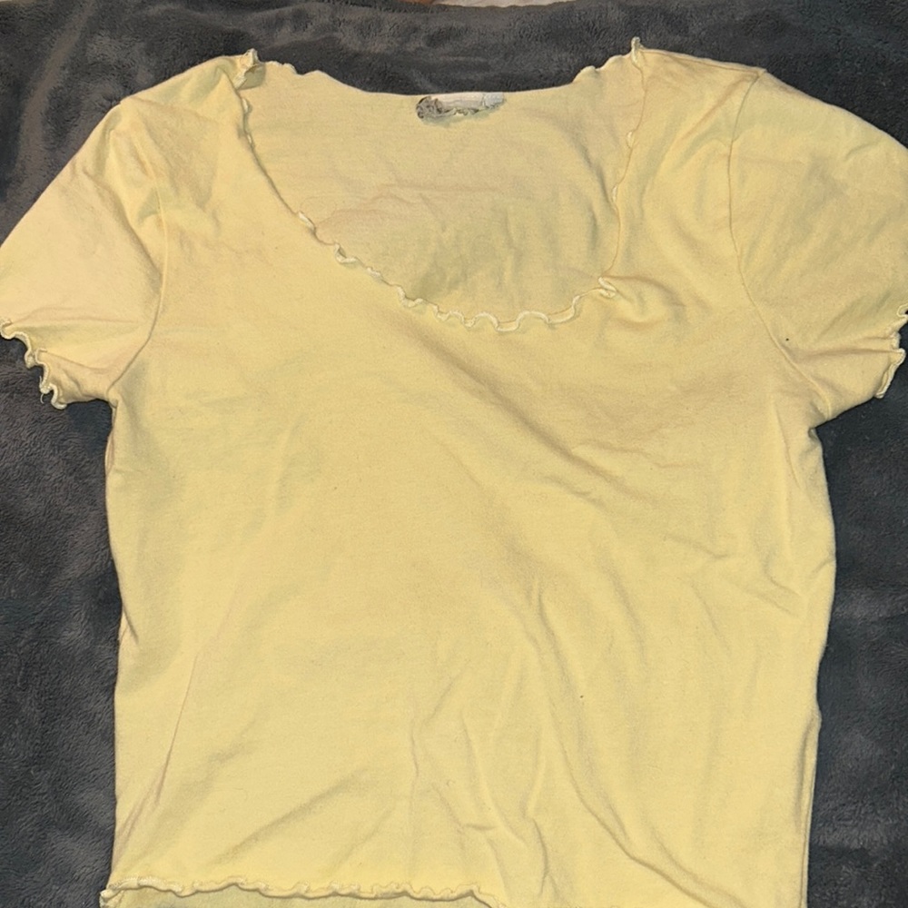 Cute yellow crop top with ruffles on the edges